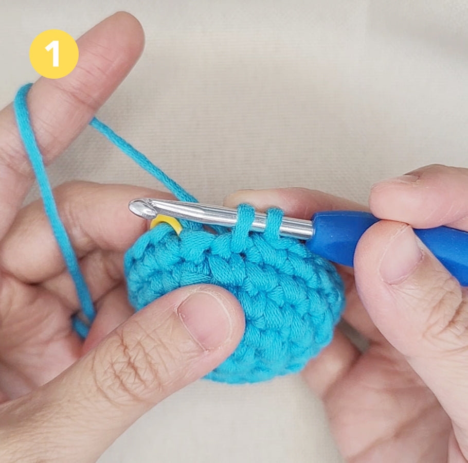 Letzte Masche der Runde vorbereiten