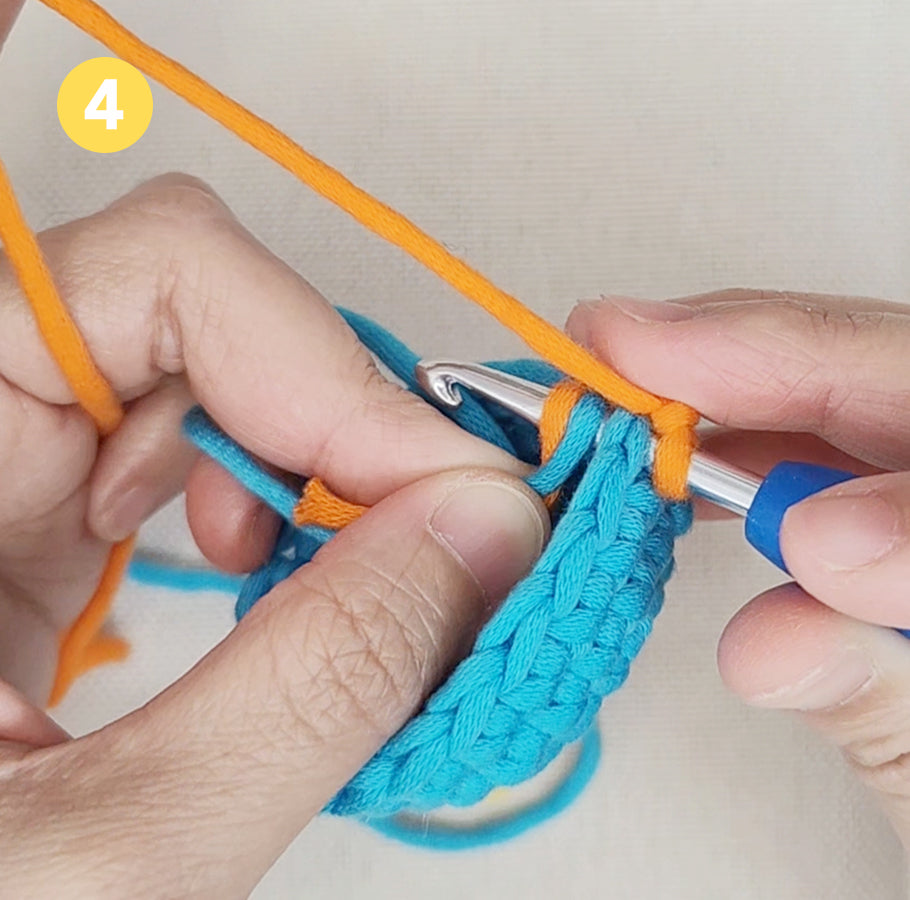 Erste Masche in neuer Farbe